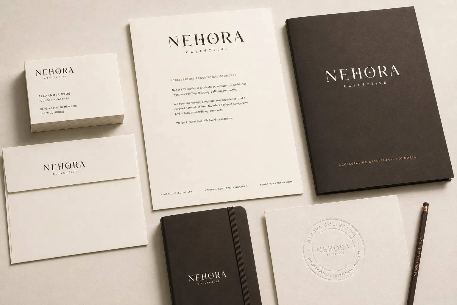 Nehora Collective stationery and presentation materials in ivory and charcoal